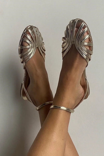 SOLE - Elegant flat woven sandals for a sophisticated look