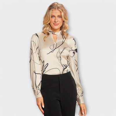 Eva - Elegant blouse with line pattern and keyhole detail