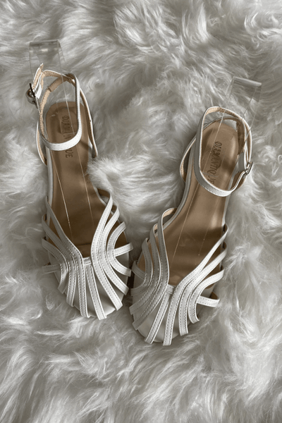 SOLE - Elegant flat woven sandals for a sophisticated look