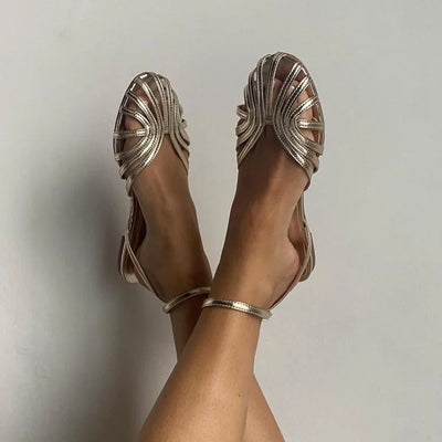 SOLE - Elegant flat woven sandals for a sophisticated look