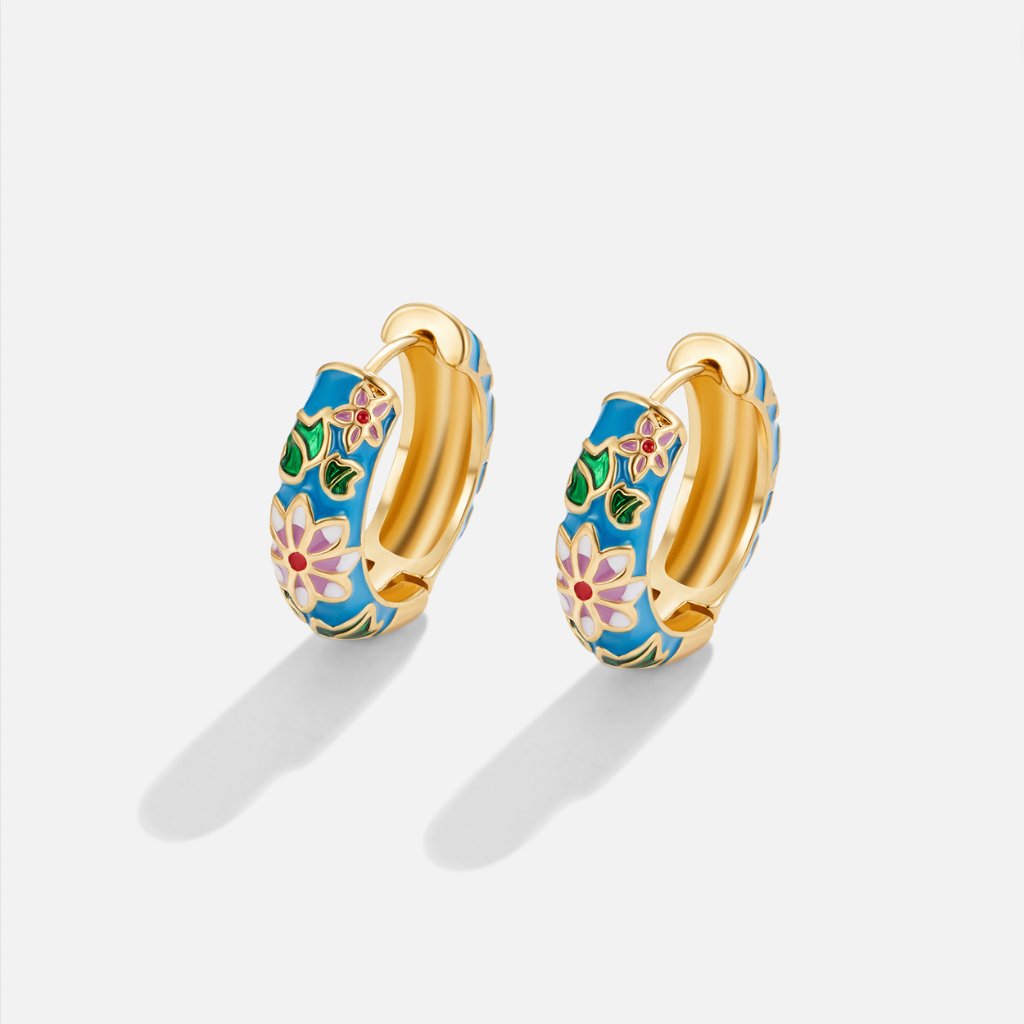 Gold circle earrings with flower